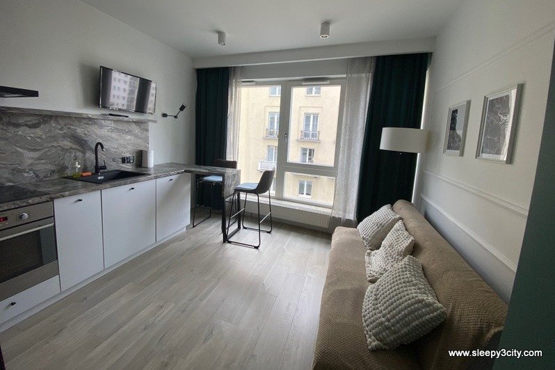 Salon z aneksem kuchennym w obiekcie Sleepy3city - Apartamenty Batorego 9/37