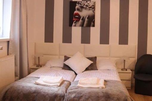Sypialnia jednego z apartamentów w obiekcie Morski Relax