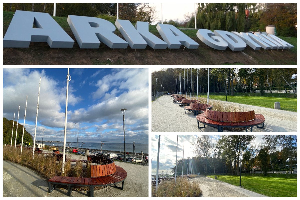 Napis przestrzenny Arka Gdynia, drewniana ławka w kształcie fali, trawniki, w oddali zatoka // fot. ZDiZ