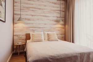 Sypialnia w jedenym z apartament&oacute;w w obiekcie Green Hill Gdynia Orłowo A