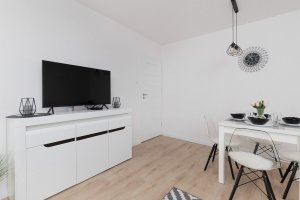 Pok&oacute;j dzienny w obiekcie noclegowym Warszawska 15/26