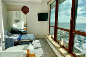 Jeden z pokoi w obiekcie Sea Towers Penthouse 28-29 two-floors sea view panoramic terrace