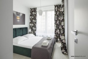 Sypialnia w obiekcie Sleepy3city Plac Unii - Obrońc&oacute;w 8/1