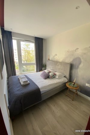 Sypialnia w obiekcie Sleepy3city - Apartament Batorego 9/37