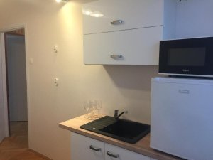 Apartamenty przy plaży, widok na aneks kuchenny