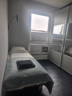 Jedna z sypialni w obiekcie Baltic Forest Apart
