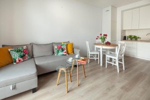 Salon z aneksem kuchennym w obiekcie Sleepy3city - Abrahama 61
