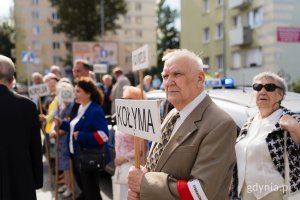 Mężczyzna z tabliczką Kołyma