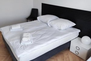 Sypialnia w obiekcie Sleepy3city - Apartamenty Plac Unii