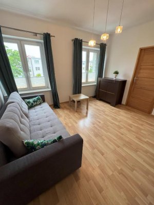 Salon w obiekcie Etezje Apartamenty - Legion&oacute;w 50