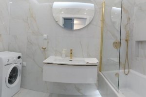 Łazienka w obiekcie Sleepy3city - Apartamenty Plac Unii