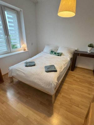 Sypialnia w obiekcie Etezje Apartamenty - Legion&oacute;w 50