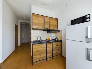 Apartament Abrahama 58, widok na aneks kuchenny
