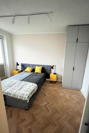 Jeden z pokoi w obiekcie Apartament RZ