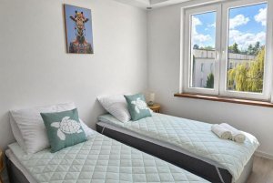 Jedna z sypialni w obiekcie Apartament Mariga Gdynia Babie Doły