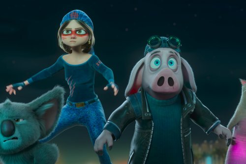 Kadr z filmu „Hitpig. Świniak zawodowiec”. Animowane postaci dziewczyna i zwierzęta stoją i patrza przed siebie.