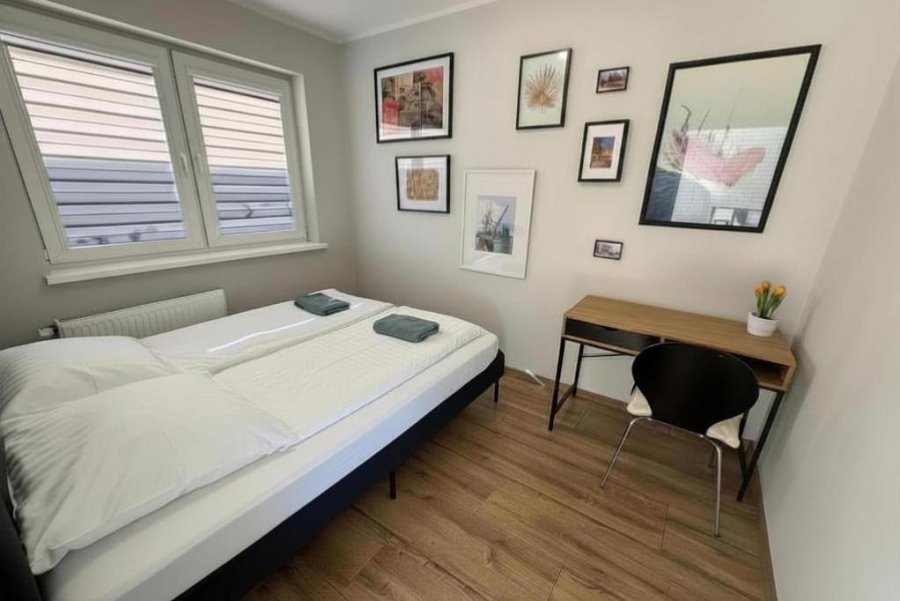 Sypialnia w obiekcie Etezje Apartamenty - Władysława IV