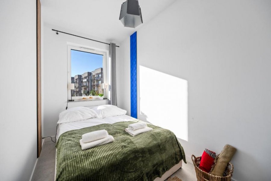 Apartament Makuszyńskiego by Homeprime, widok na sypialnię