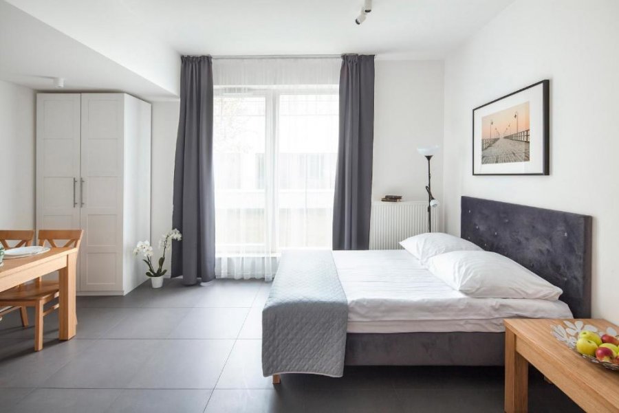 Pok&oacute;j w obiekcie typu studio Sleepy3city Batorego 9/64