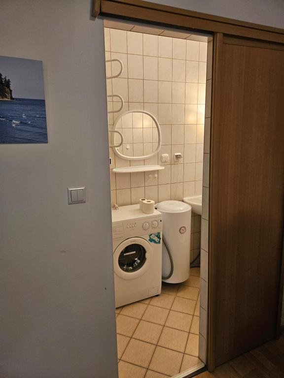 Łazienka w obiekcie noclegowym Apartament Ewa
