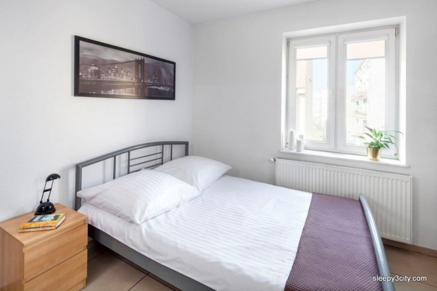 Apartamenty Sleepy3city, jeden z apartamentów, widoki na sypialnię