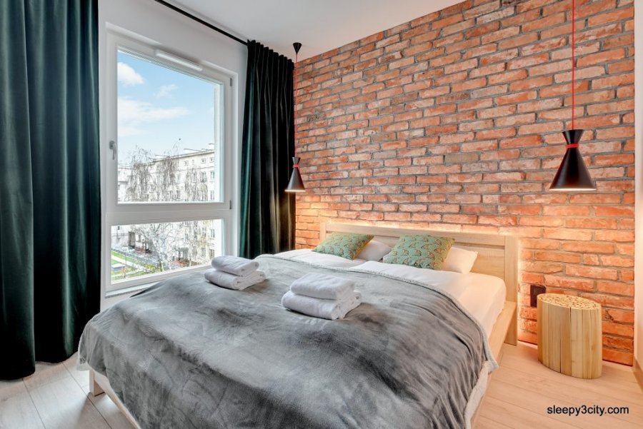 Apartamenty Sleepy3city Premium, widok na sypialnię