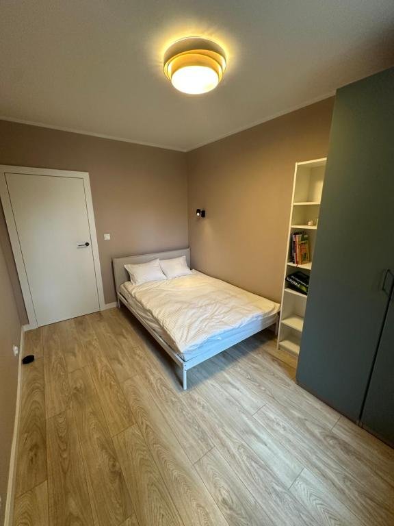 Jedna z sypialni w obiekcie Charming Apartment Boulvard