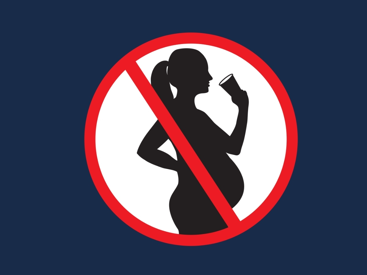 Przekreślony znak kobiety w ciąży pijącej alkohol