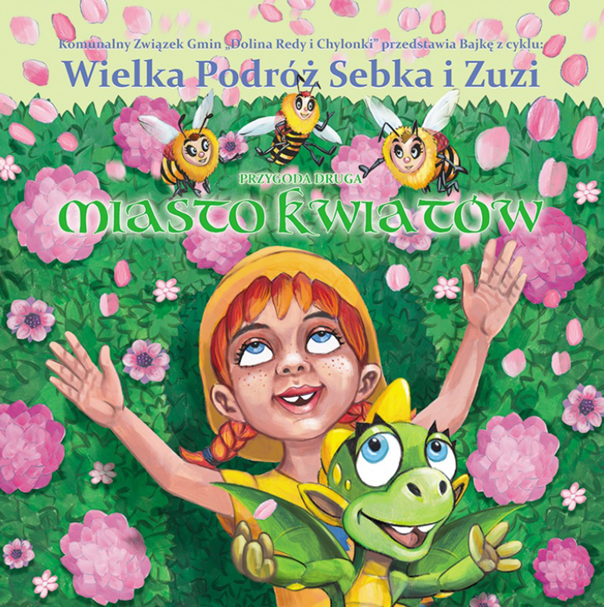 Na zdjęciu okładka jednej z bajek ekologicznych: dziewczynka, pszczoły i mały smok na tle kwiat&oacute;w//mat. pras. KZG