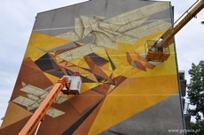 Prace nad muralem na budynku przy ul. Żeromskiego, fot.: Michał Kowalski