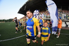 Zawodnicy drużyn RC Arka Gdynia i Budowlanych Łódź wychodzą n murawę Narodowego Stadionu Rugby w Gdyni, fot. Michał Puszczewicz