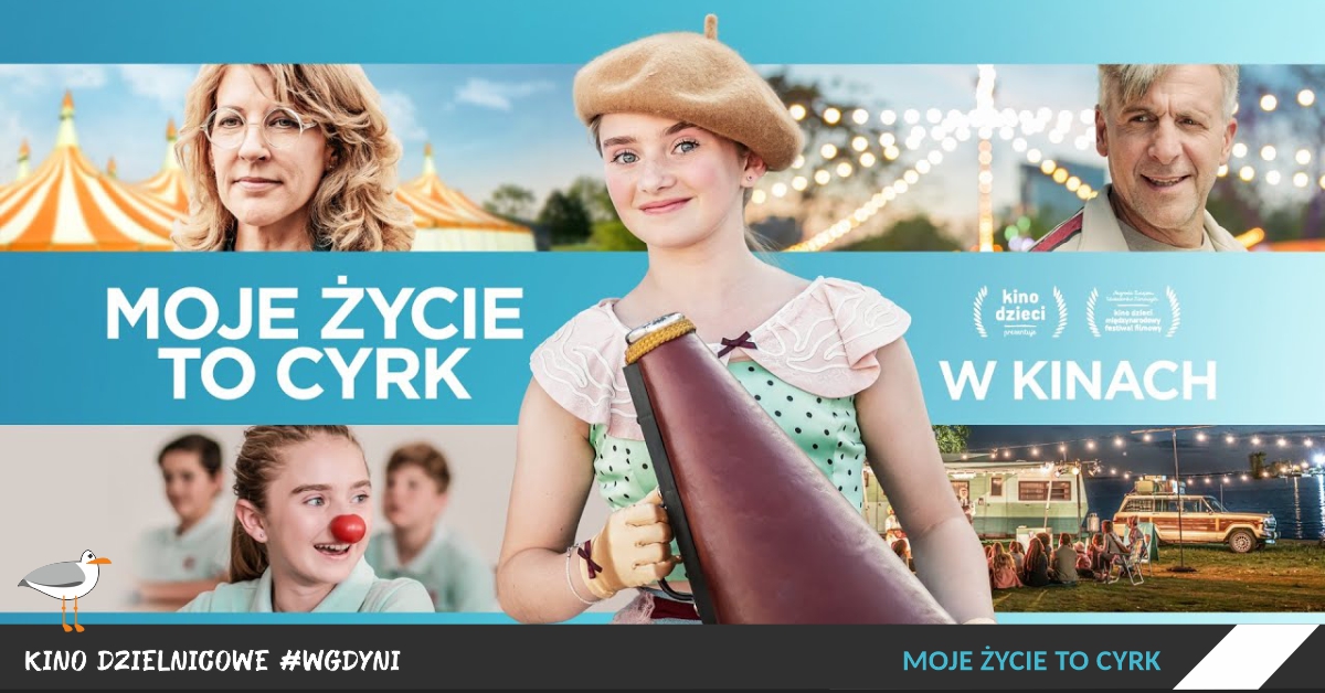 kadr z filmu "Moje życie to cyrk" dziewczynka z megafonem, za nią namiot cyrkowy i inne postaci z cyrku