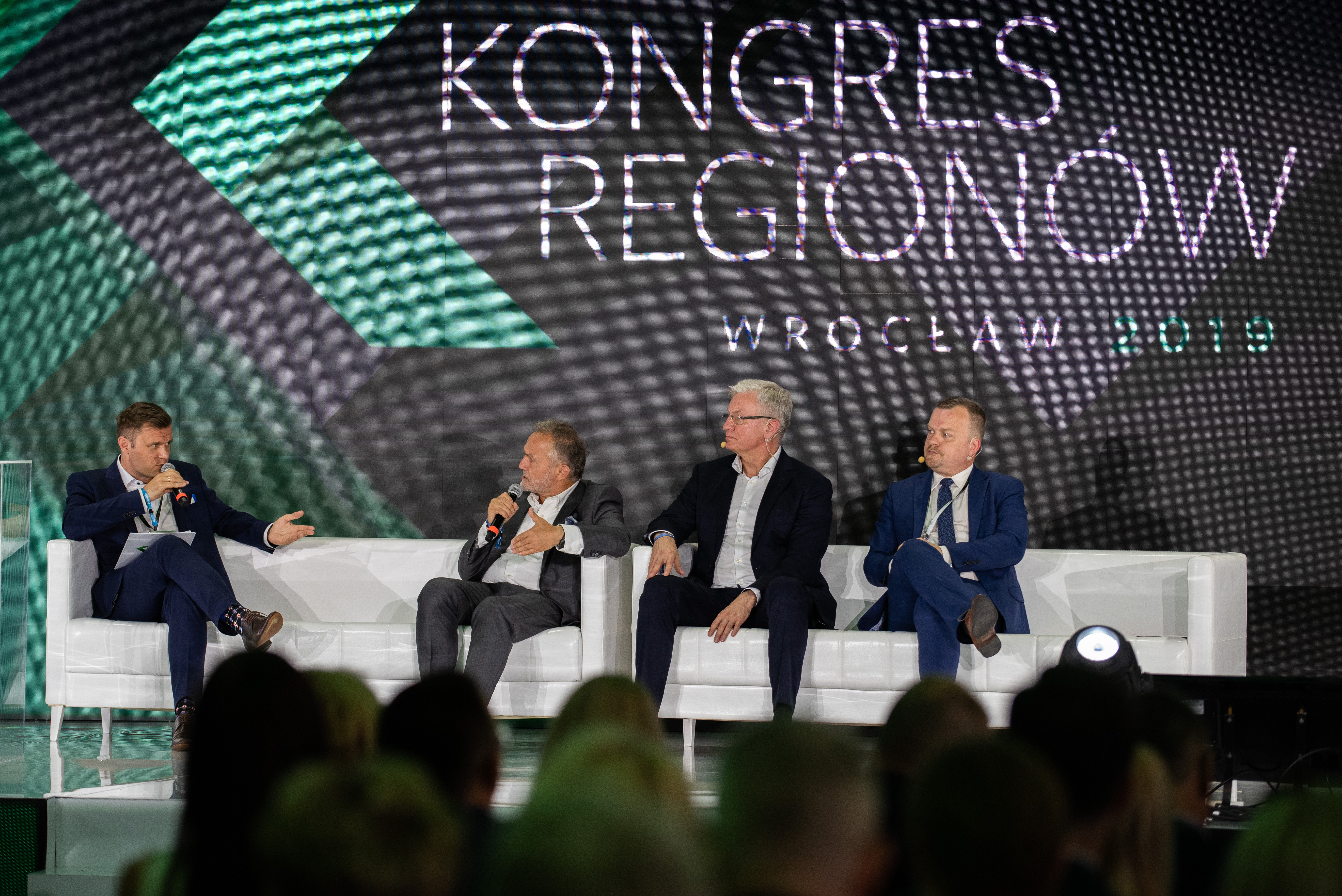 Kontrdebata na temat mobilności, od lewej Piotr Kozanecki, Wojciech Szczurek, Jacek Jaśkowiak i Arkadiusz Chęciński, fot. kongresregionow.pl