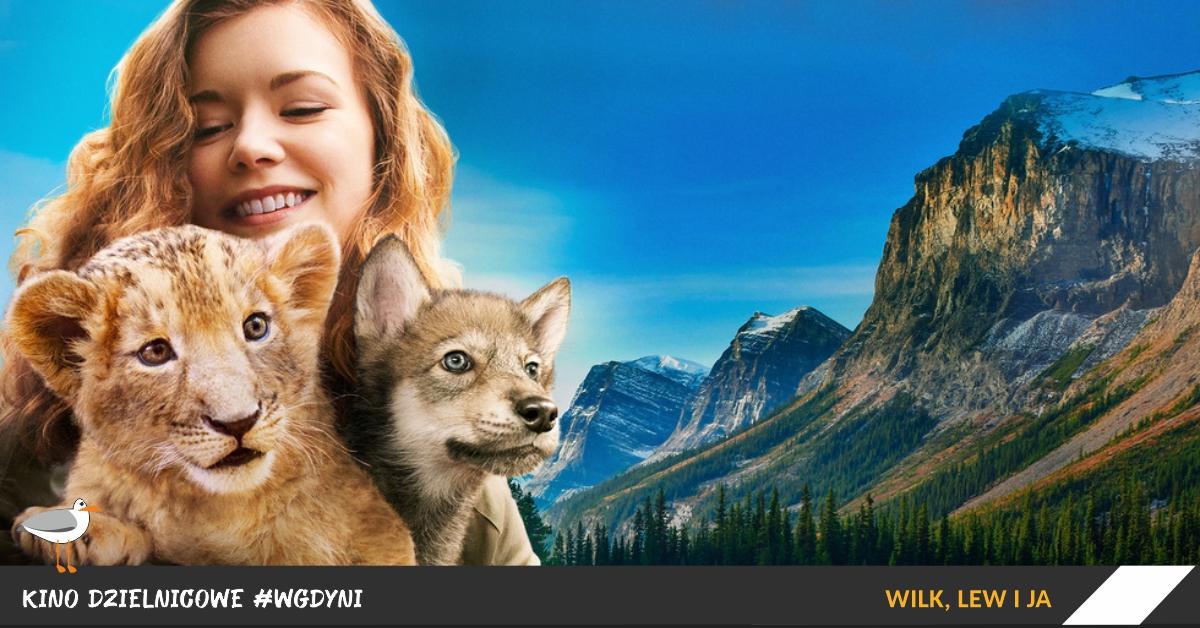 kadr z filmu, na nim dziewczynka z małym lwem i wilkiem, w tle góry