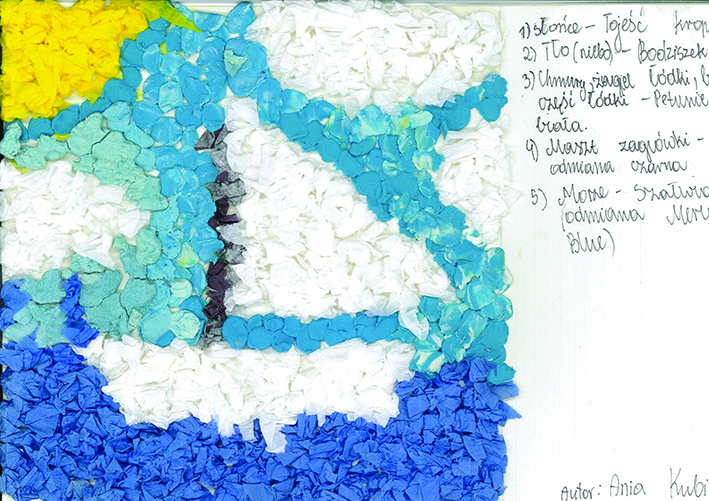 Na zdjęciu ułożona z kwiatk&oacute;w żagl&oacute;wka, fale i słońce