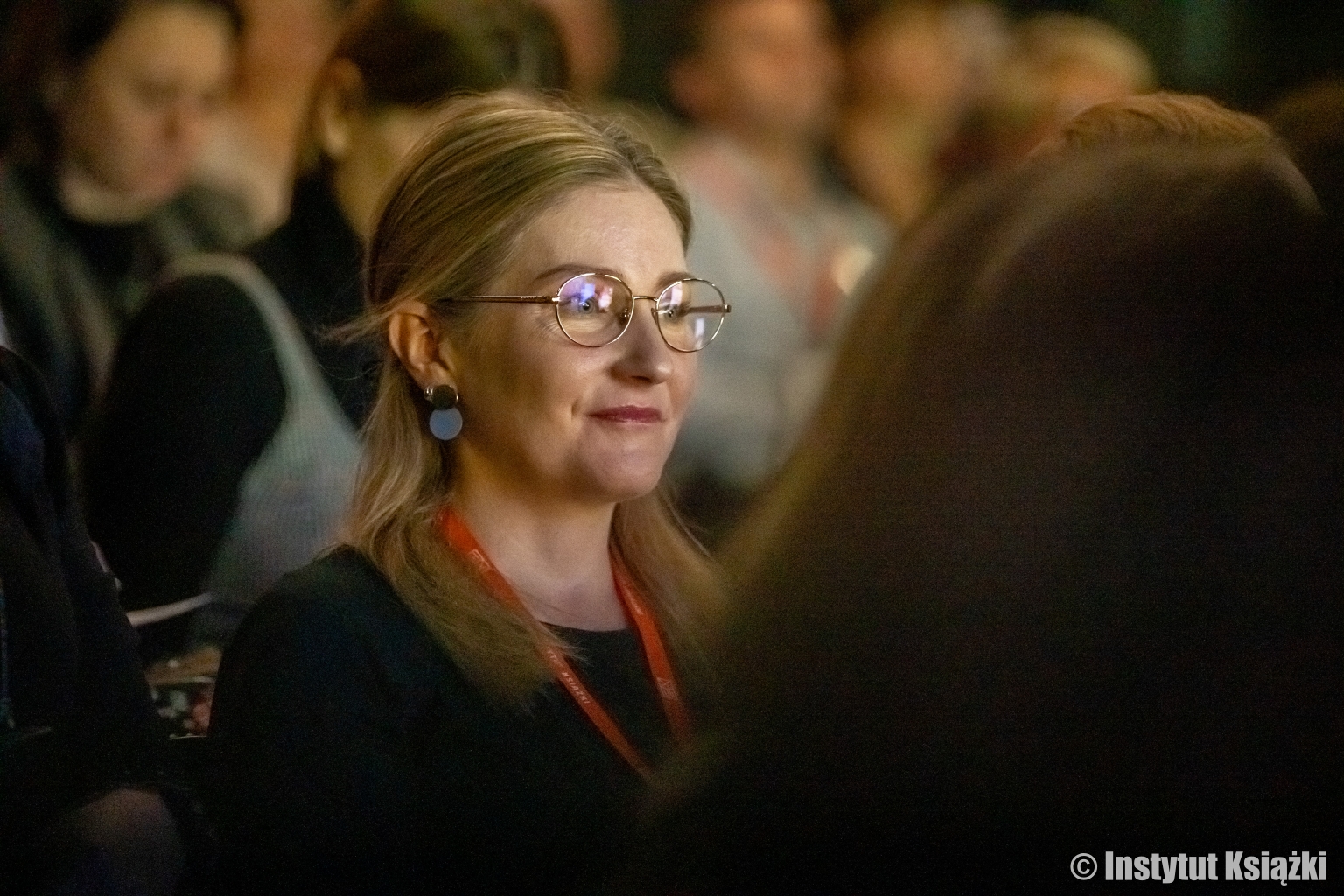 Uczestniczka debaty z widowni 